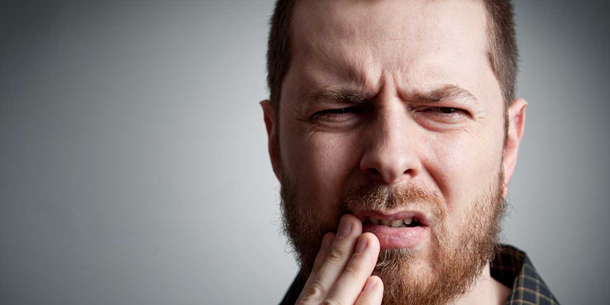 Man in Mouth Pain